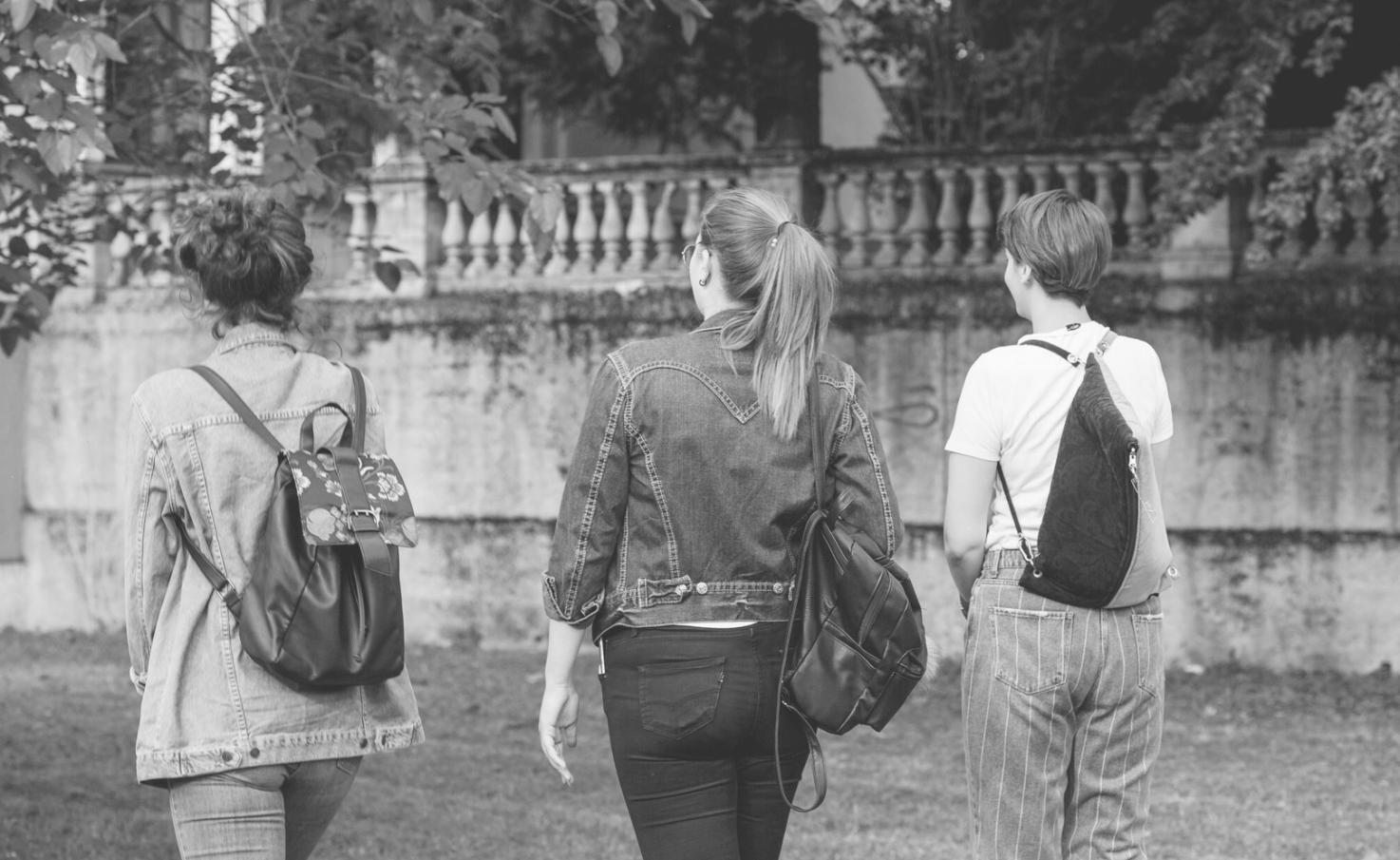 Business planning session with entrepreneurs reviewing market analysis documents